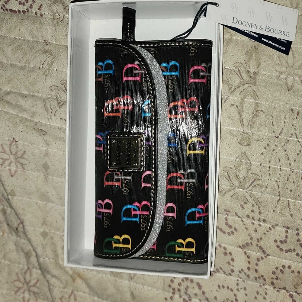 Dooney and Bourke multi color tri fold wallet